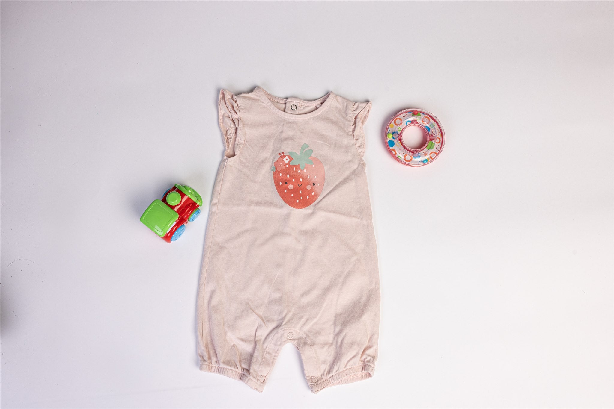 Strawberry-decorated rompers