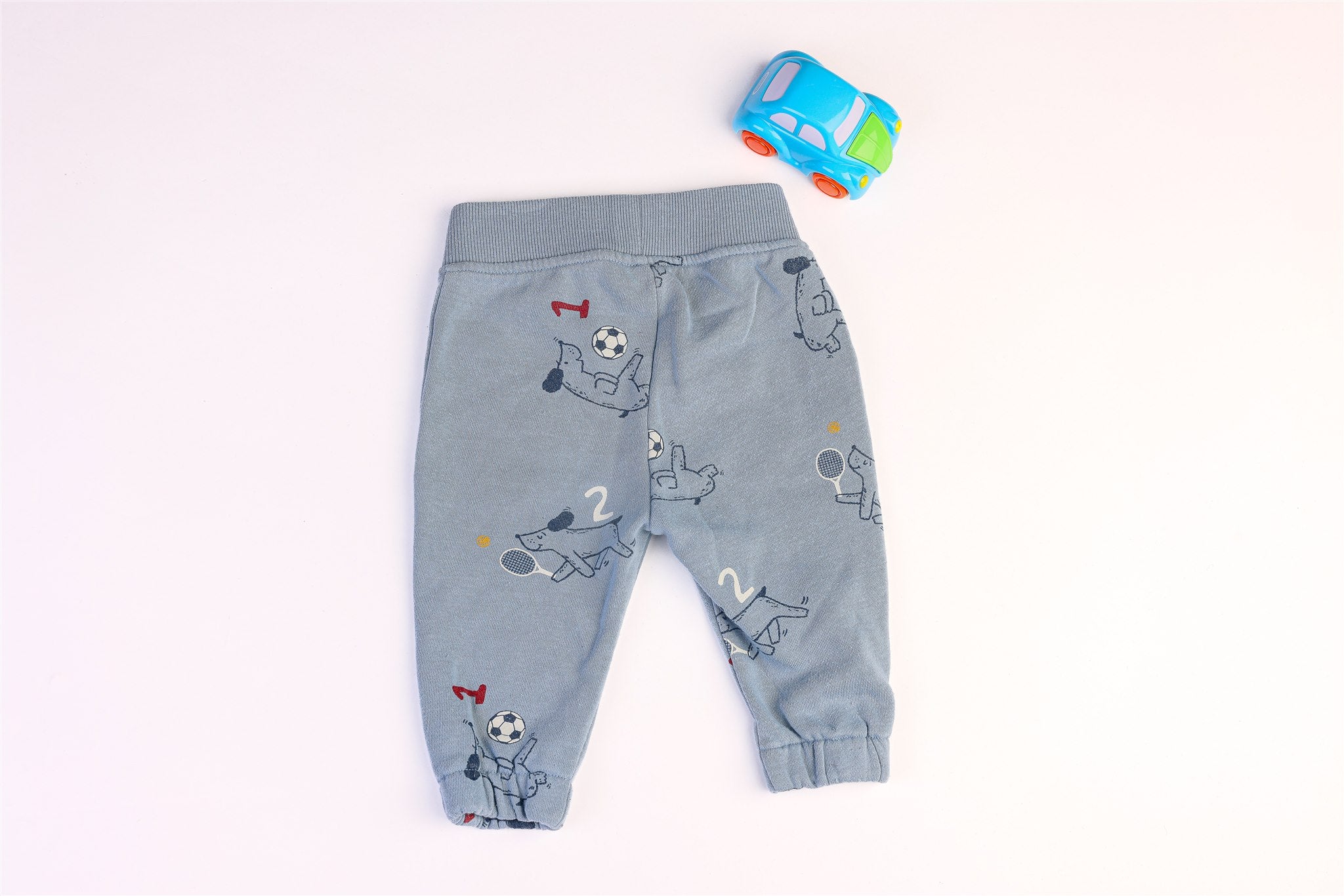 Blue trousers with dog and ball print