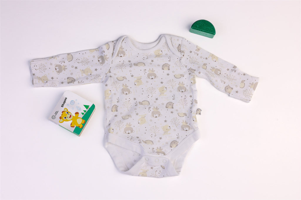 White bodysuit with hedgehogs and teddy bears