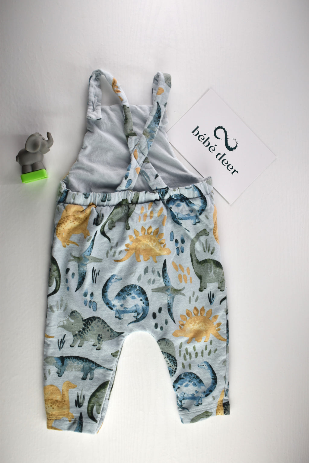 Dungarees with an all-over dinosaur print