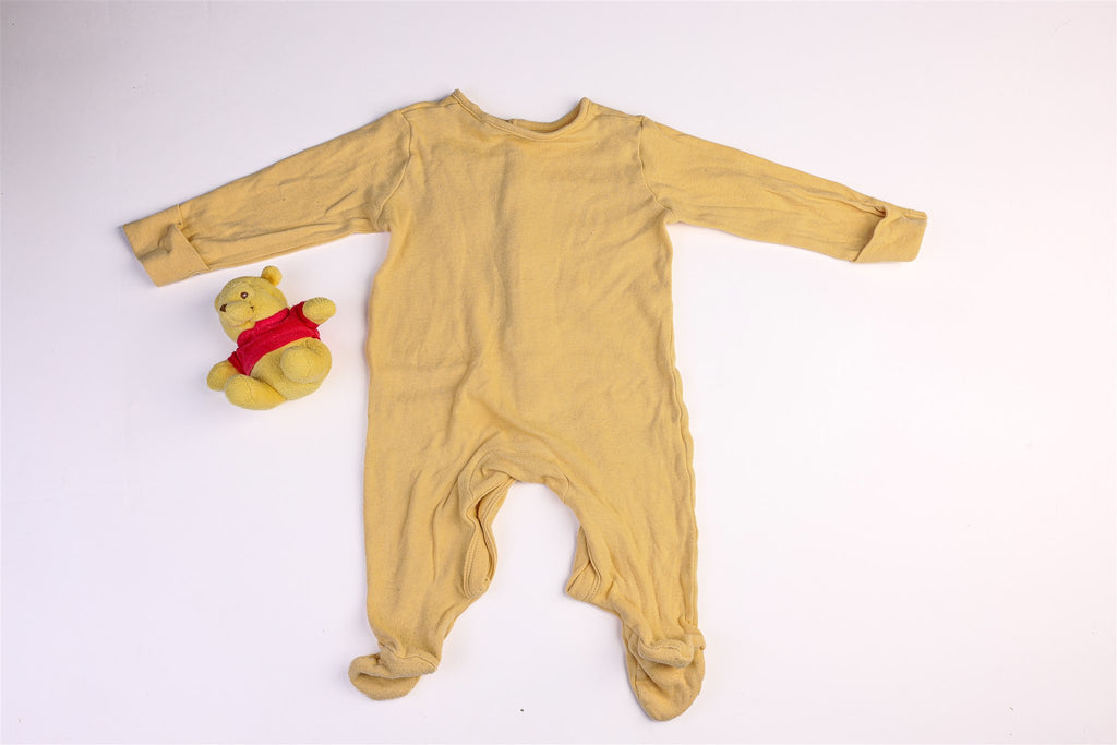 Yellow sleepsuit with a giraffe head