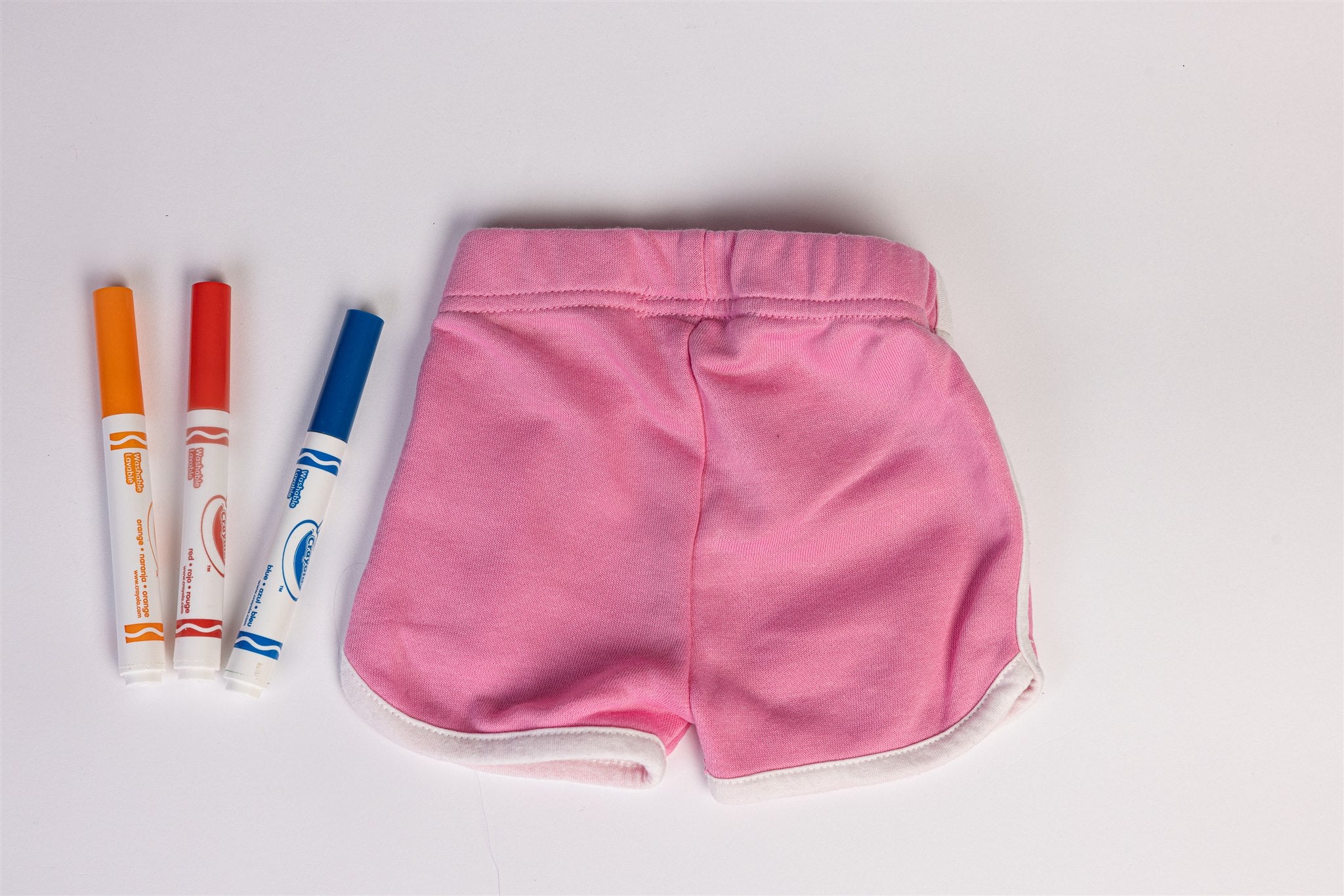 Pink shorts with white stripes