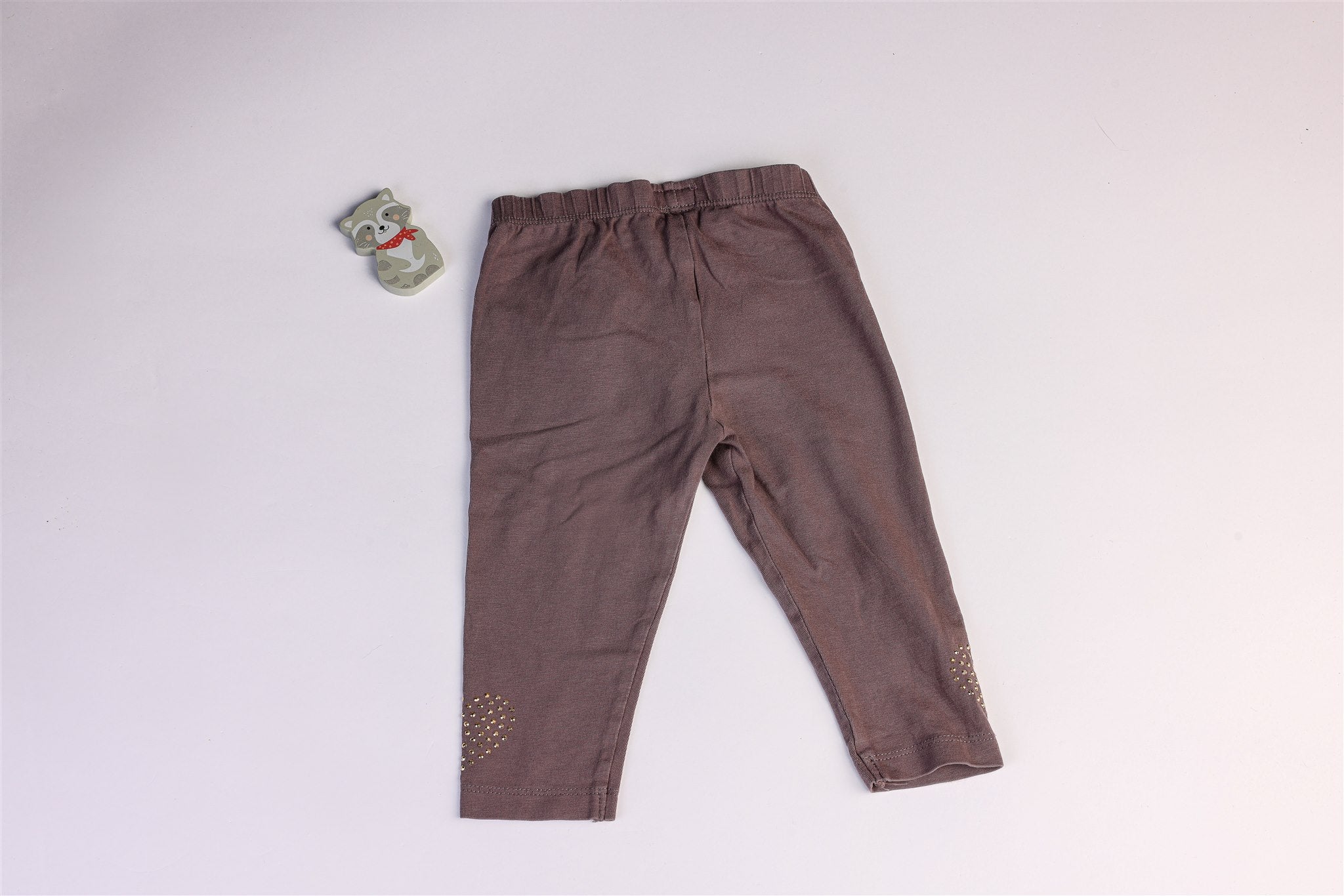 Trousers with rhinestone hearts