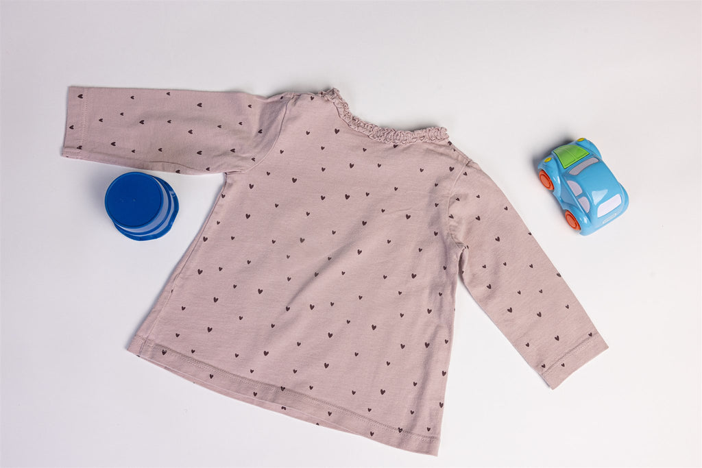 Pink top with black hearts