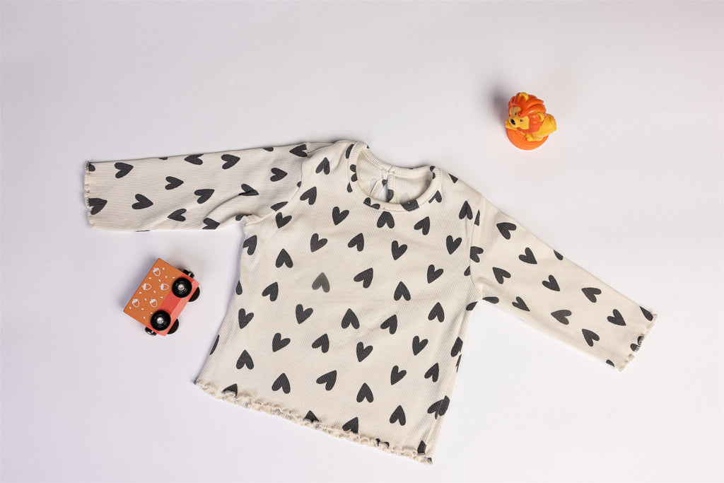 Top with black hearts