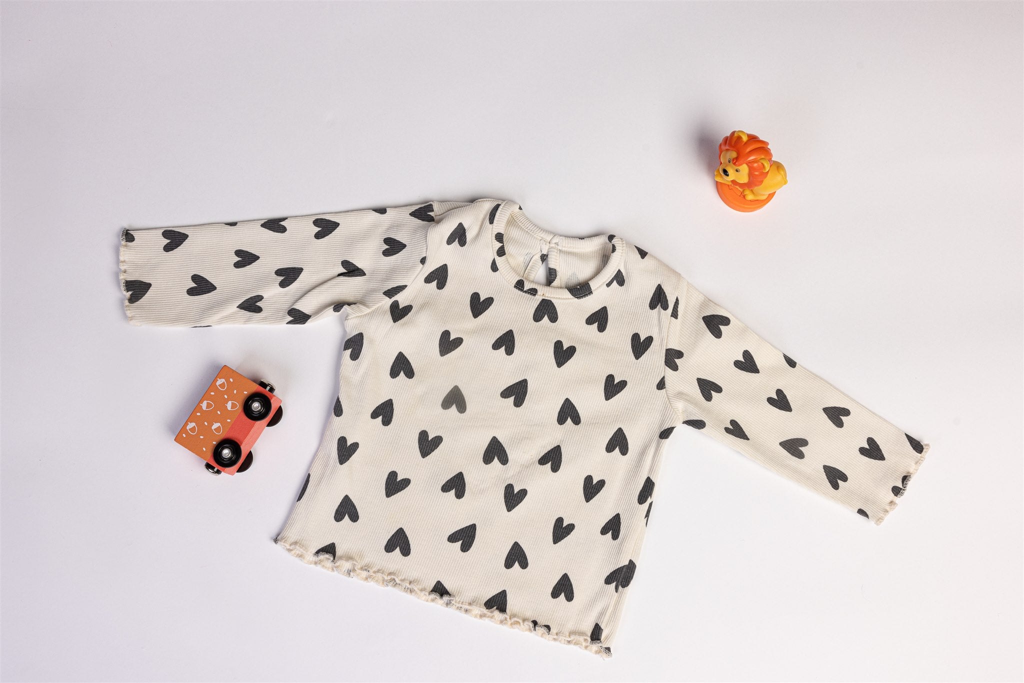 Top with black hearts