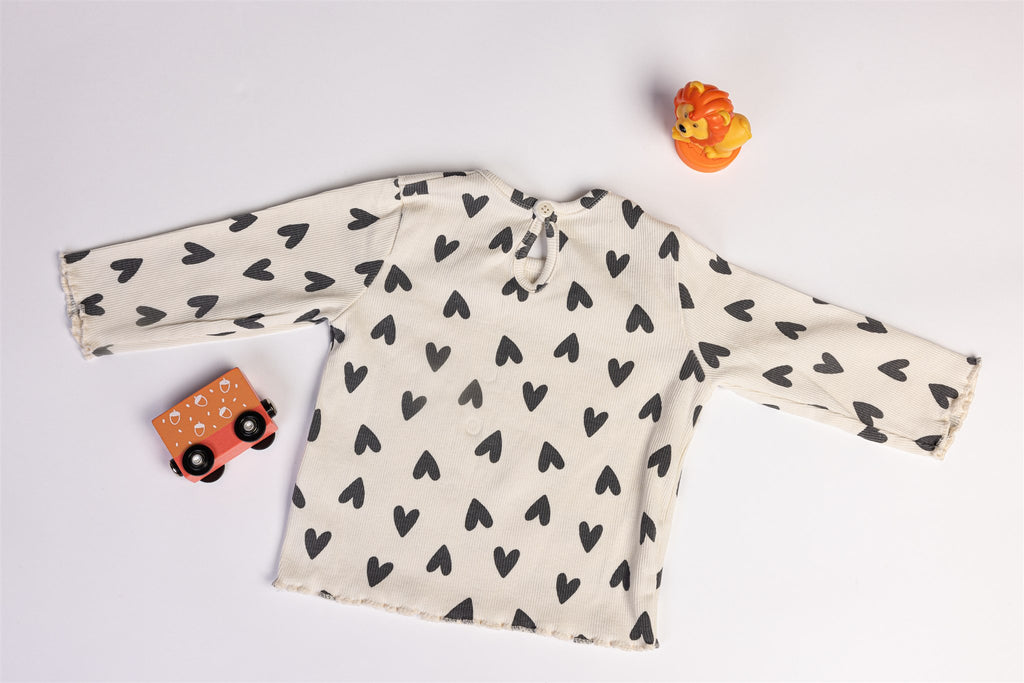 Top with black hearts