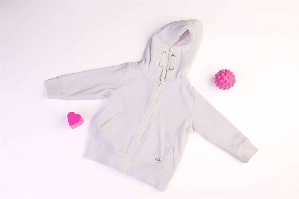 White hooded jacket "Next amazing, make your own magic"