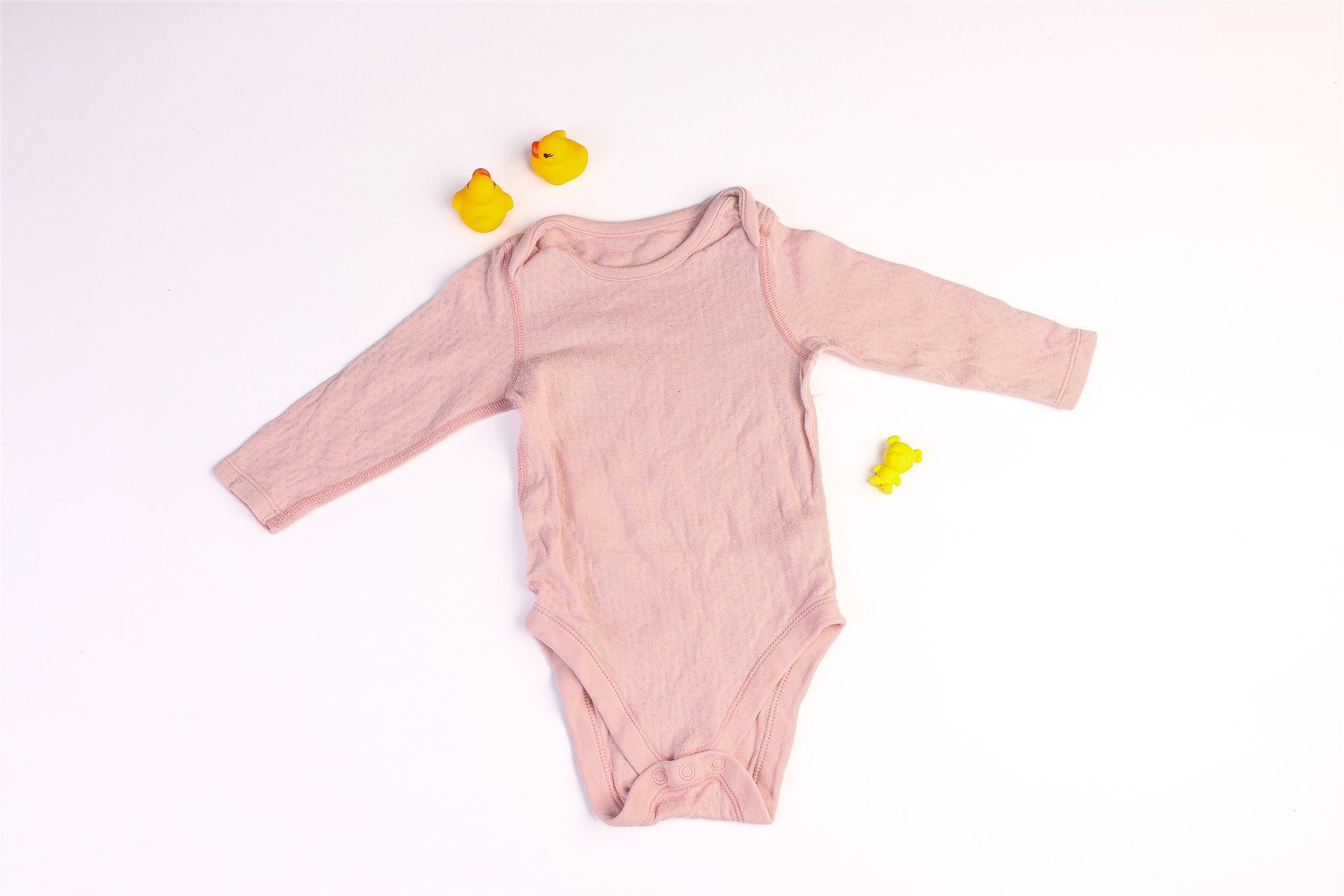 Pink long-sleeved bodysuit