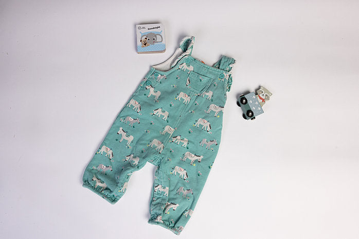 Green dungarees with horse detailing