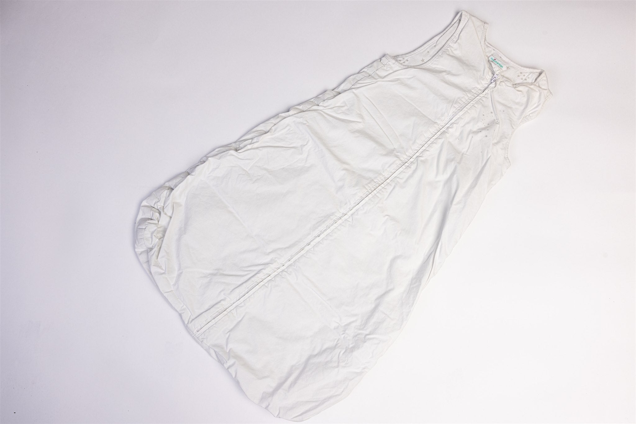 White sleeping bag with gray stars