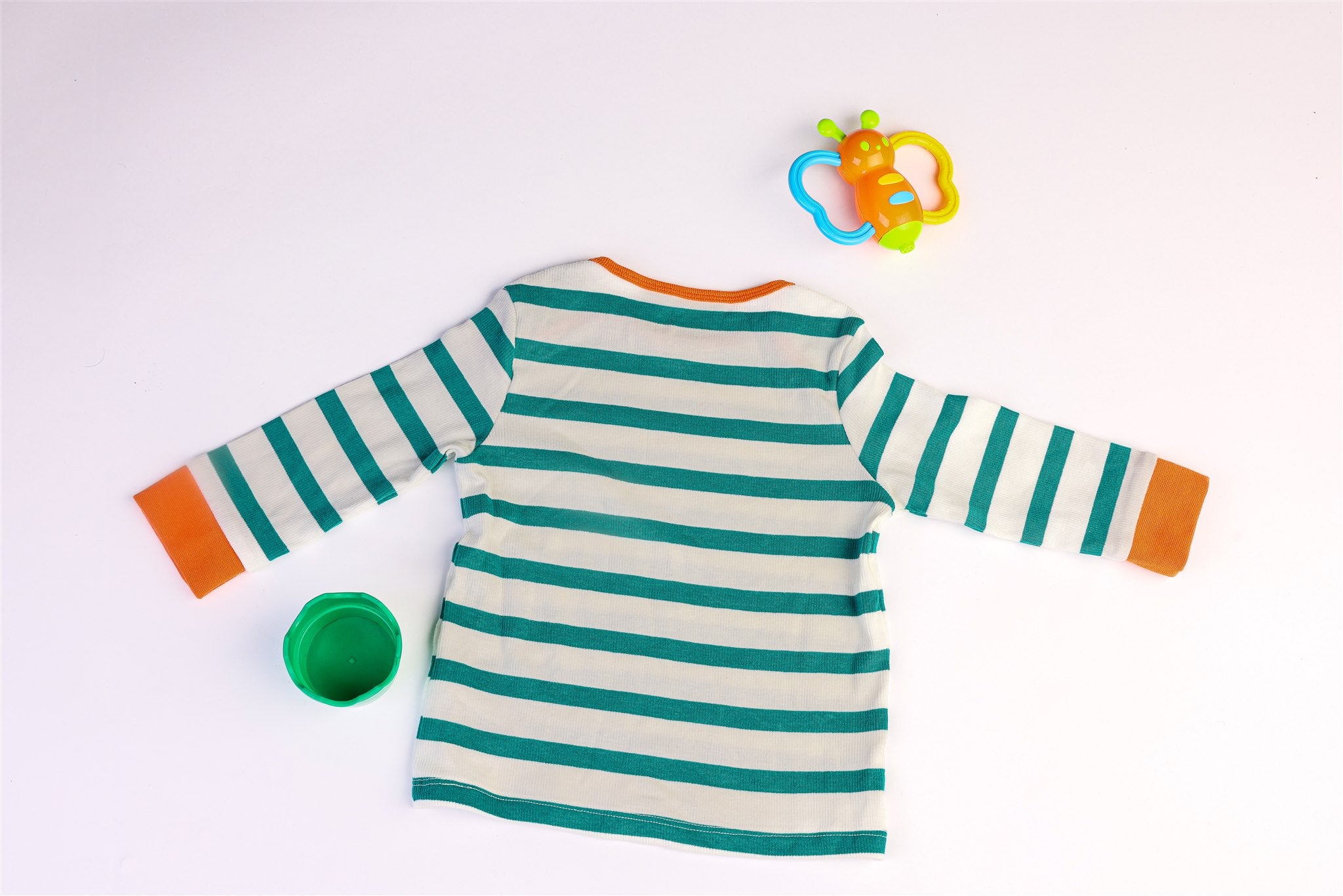 Green striped top with orange trim