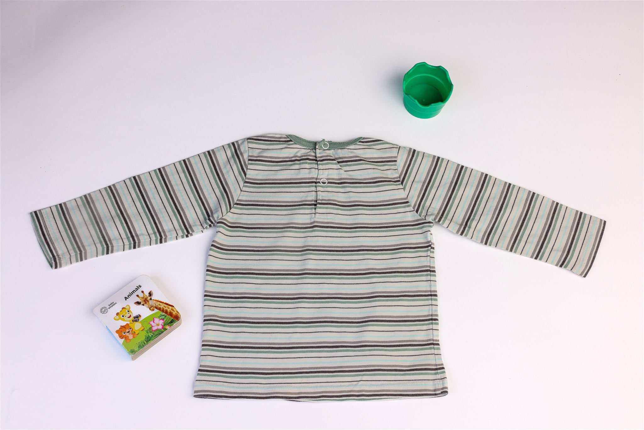 Striped owl with inflatable ball top