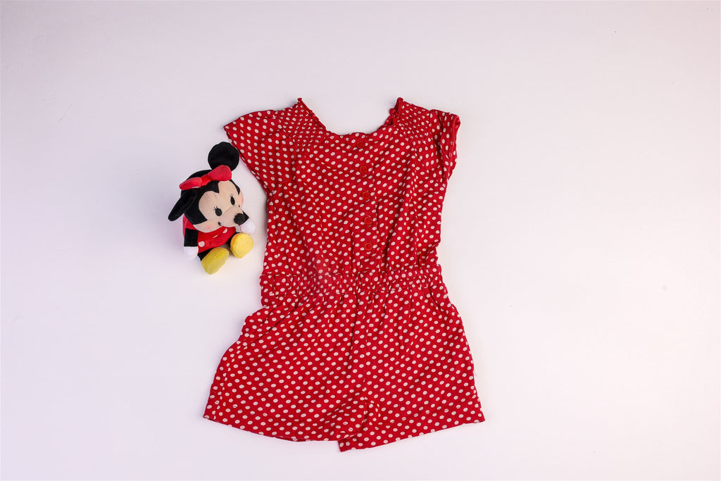 Red dungarees with white polka dots