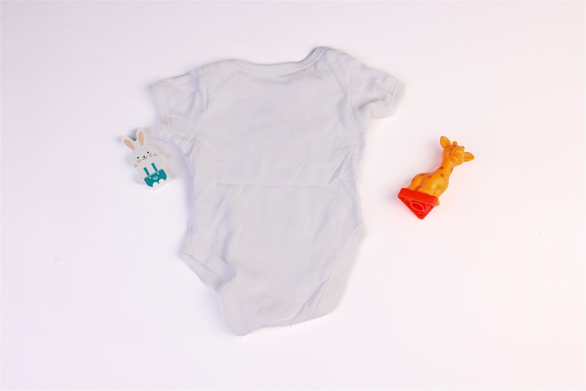 White bodysuit with lion and mouse print