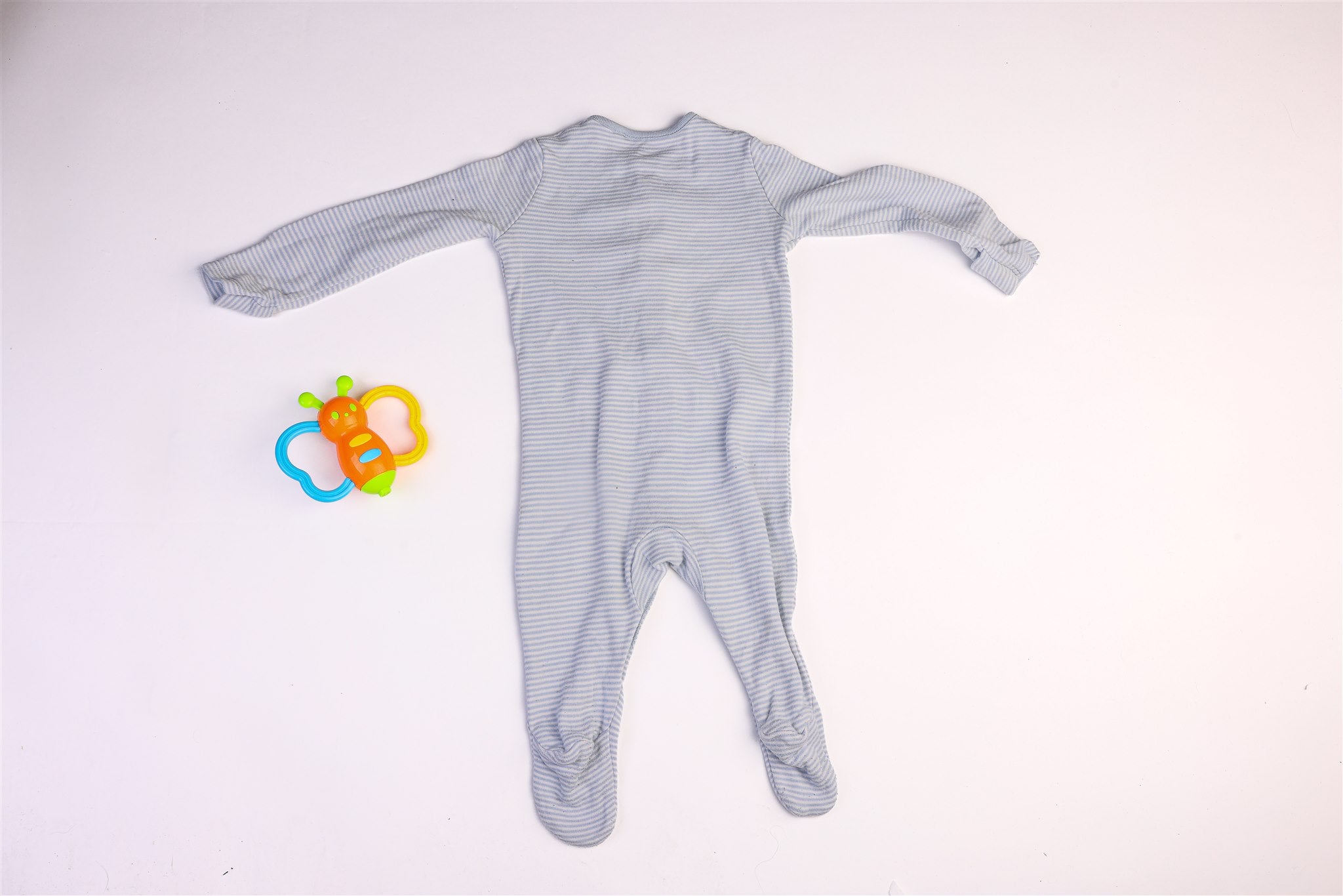 Blue striped sleepsuit with small blue star