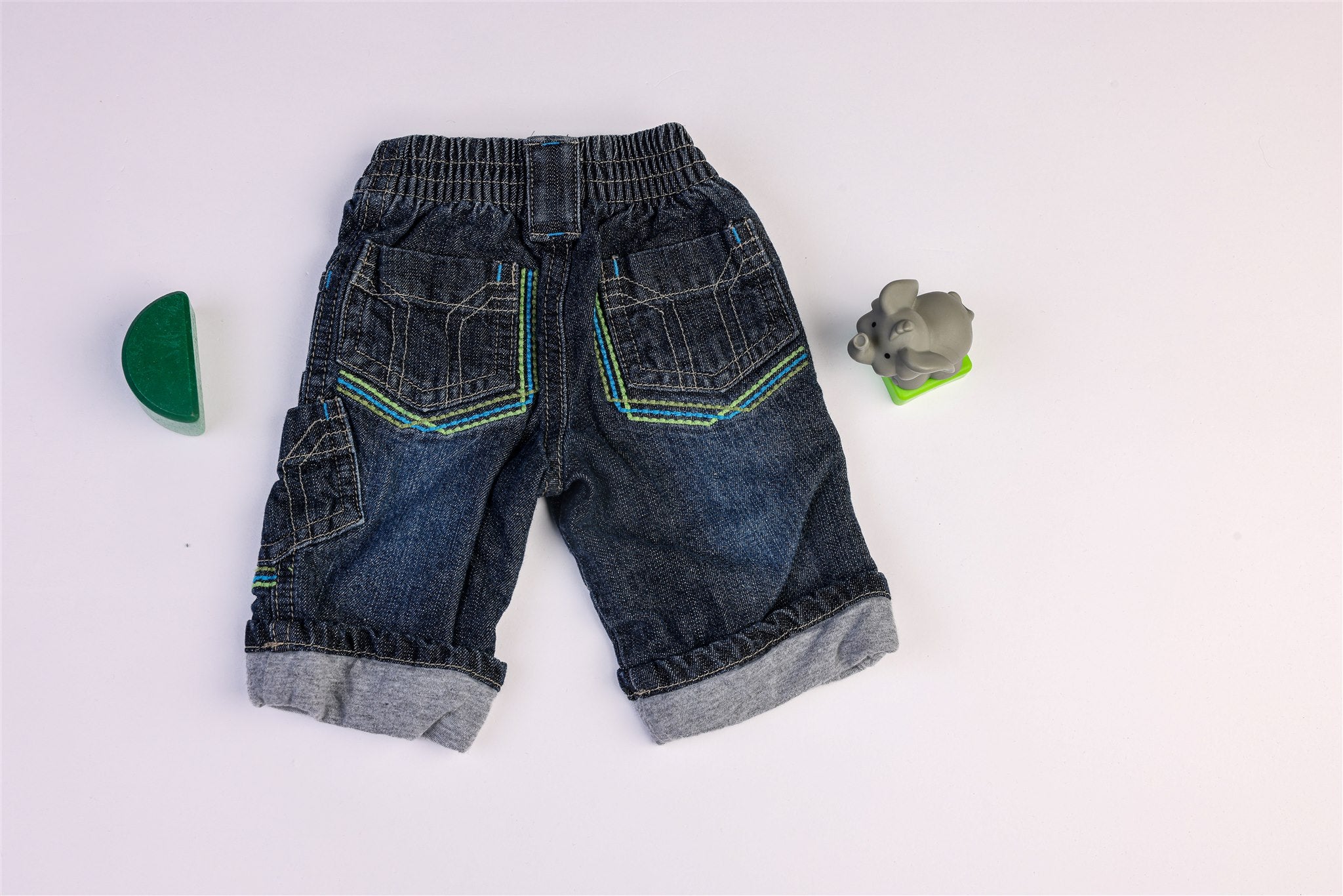 Jeans with blue and green stitching
