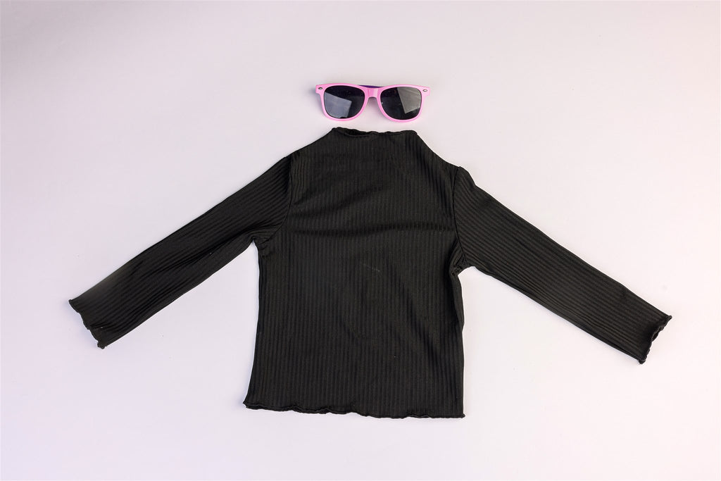 Black top with slightly ruffled collar