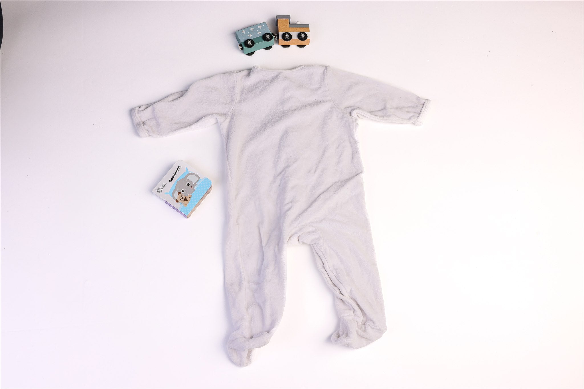 White skeepsuit with feathers