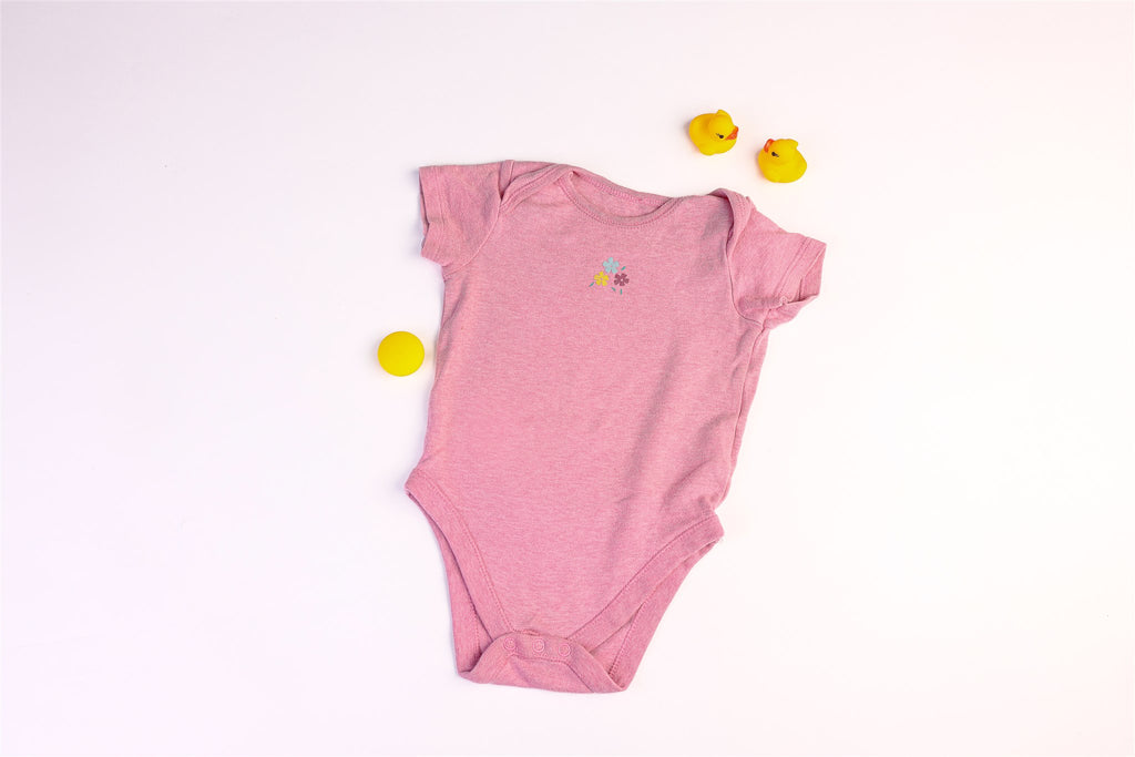 Pink bodysuit with flowers