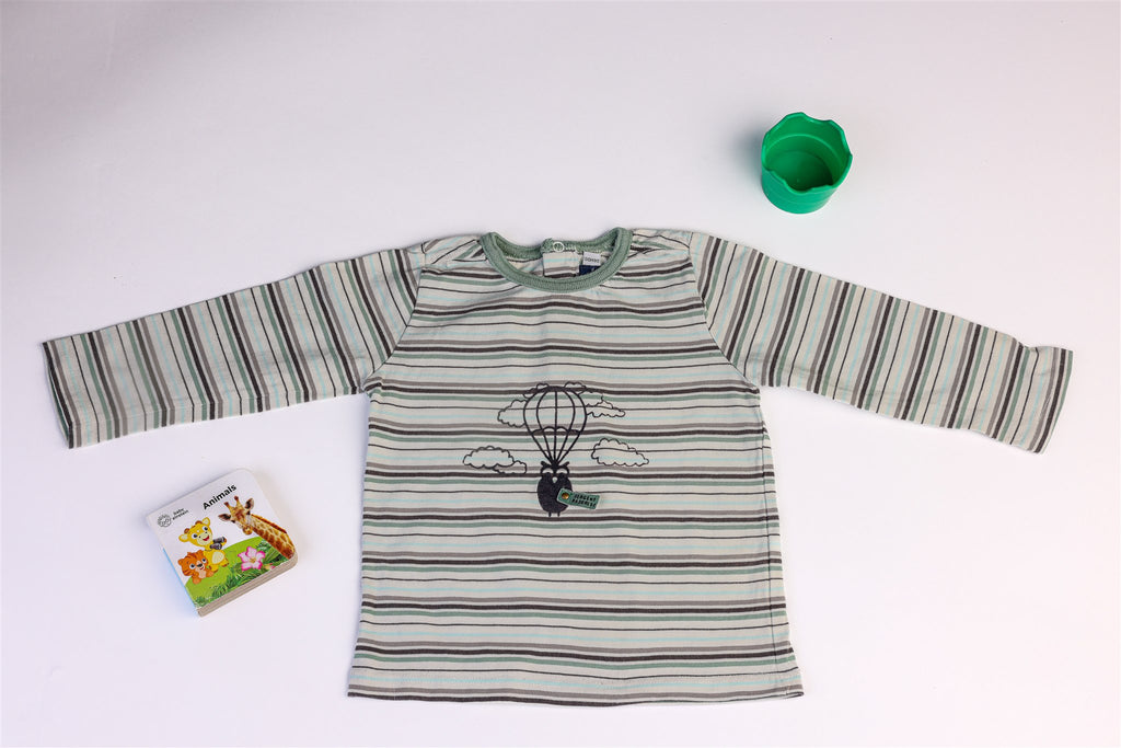 Striped owl with inflatable ball top