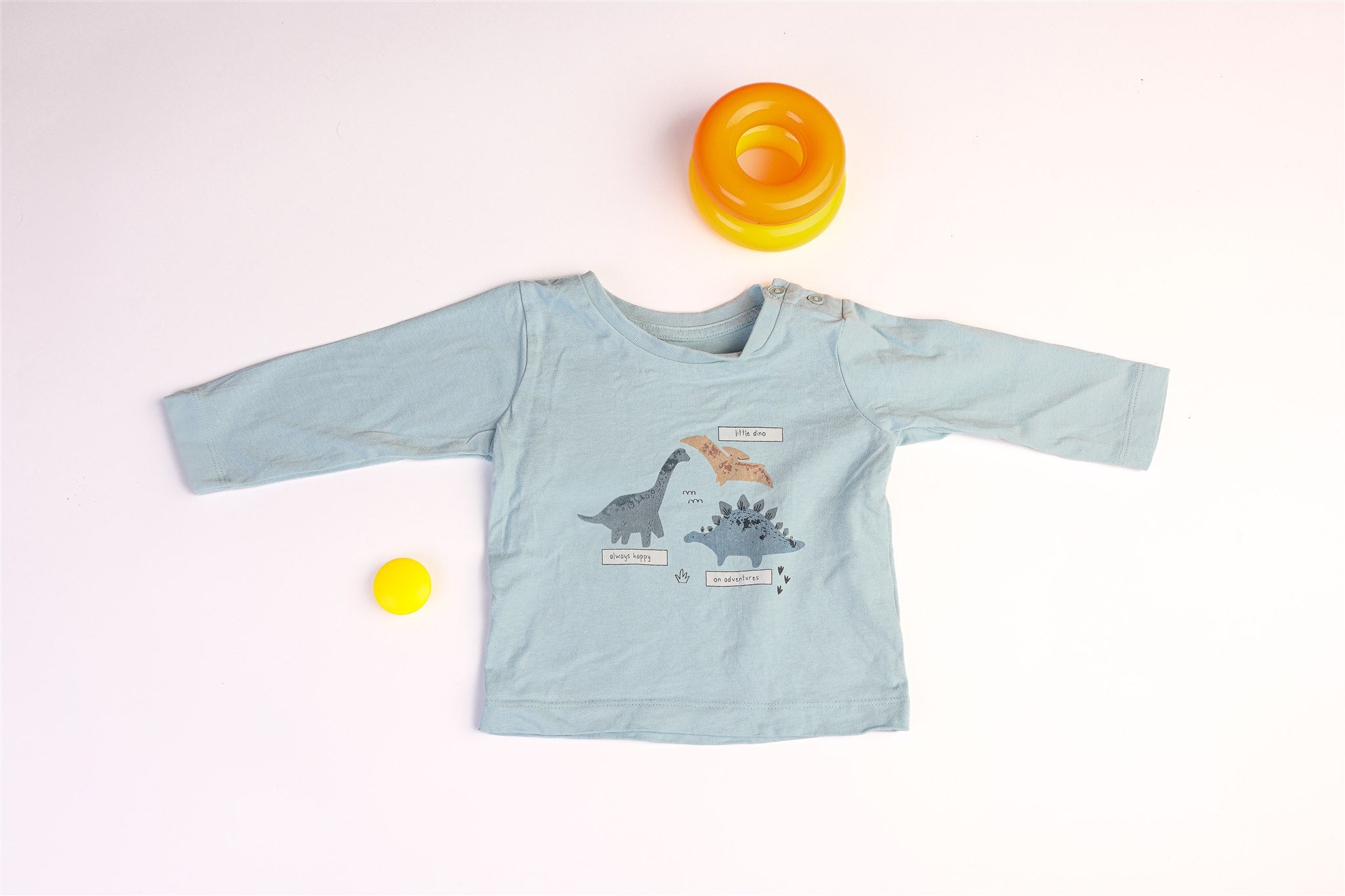 Blue long-sleeved dinosaur top