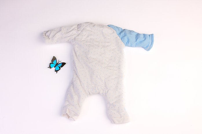 Blue and white smiley face baby sleepsuit