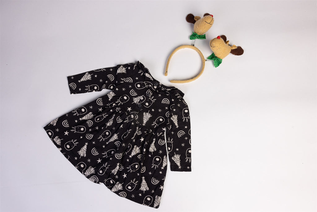 Black dress with reindeer and christmas tree motifs