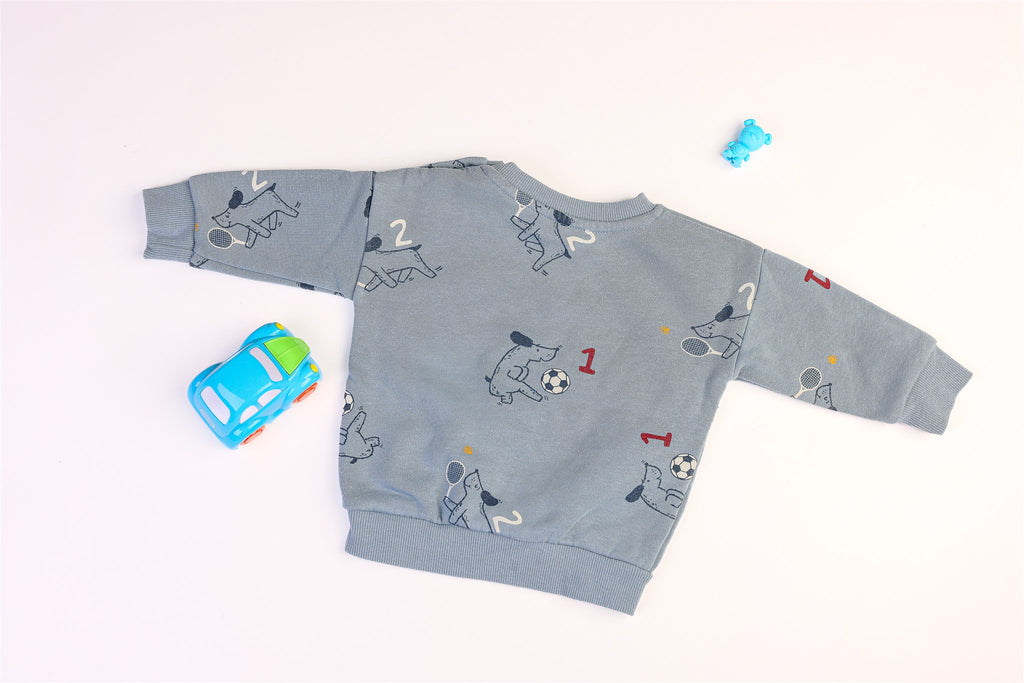 Blue long-sleeved jumper with dogs and balloons