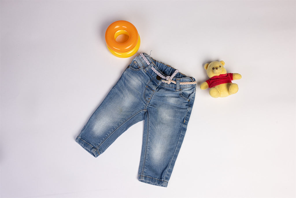 Jeans with decorative pink and purple waistband