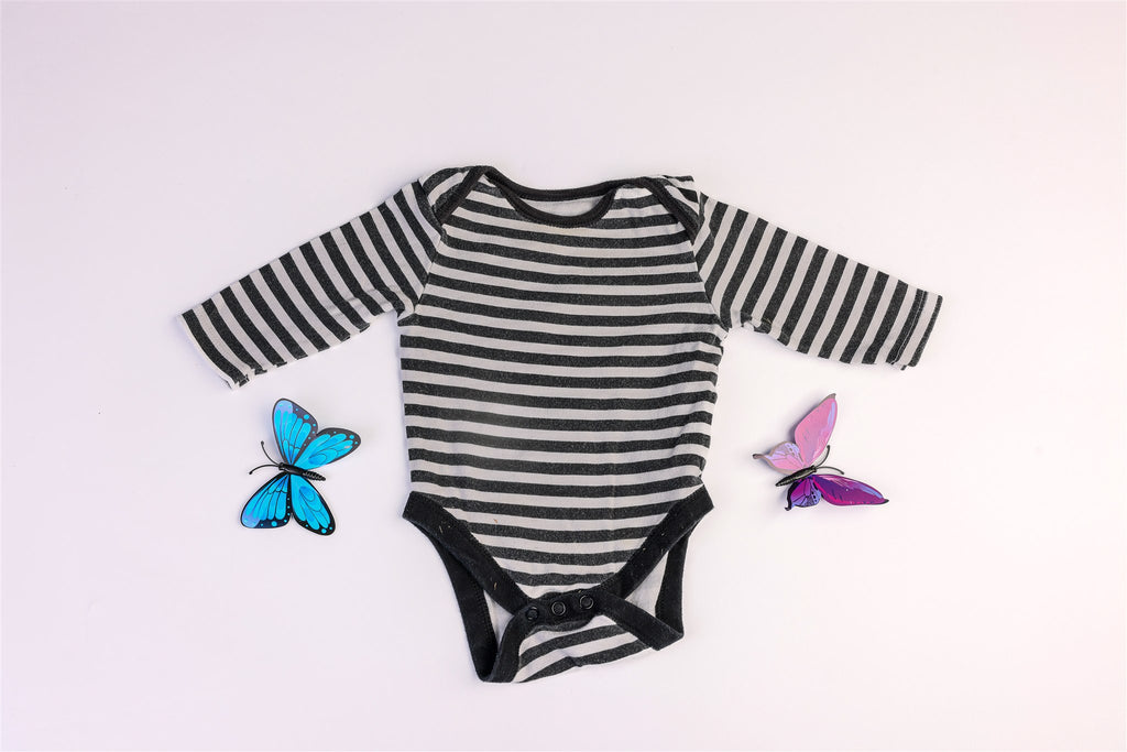 Black and white striped long-sleeved bodysuit