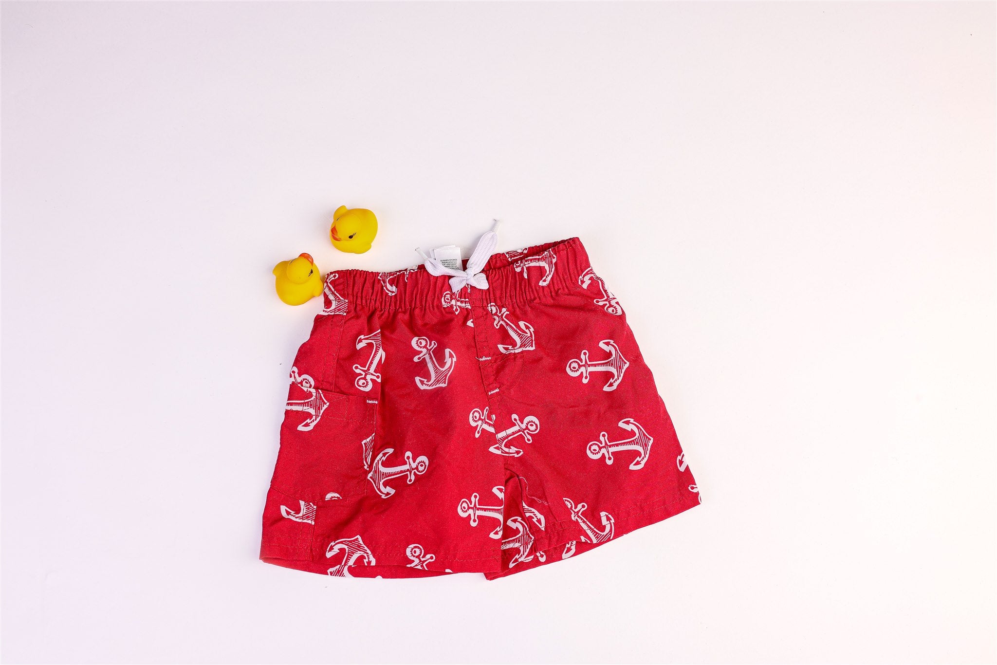 Red swimsuit with anchor pattern