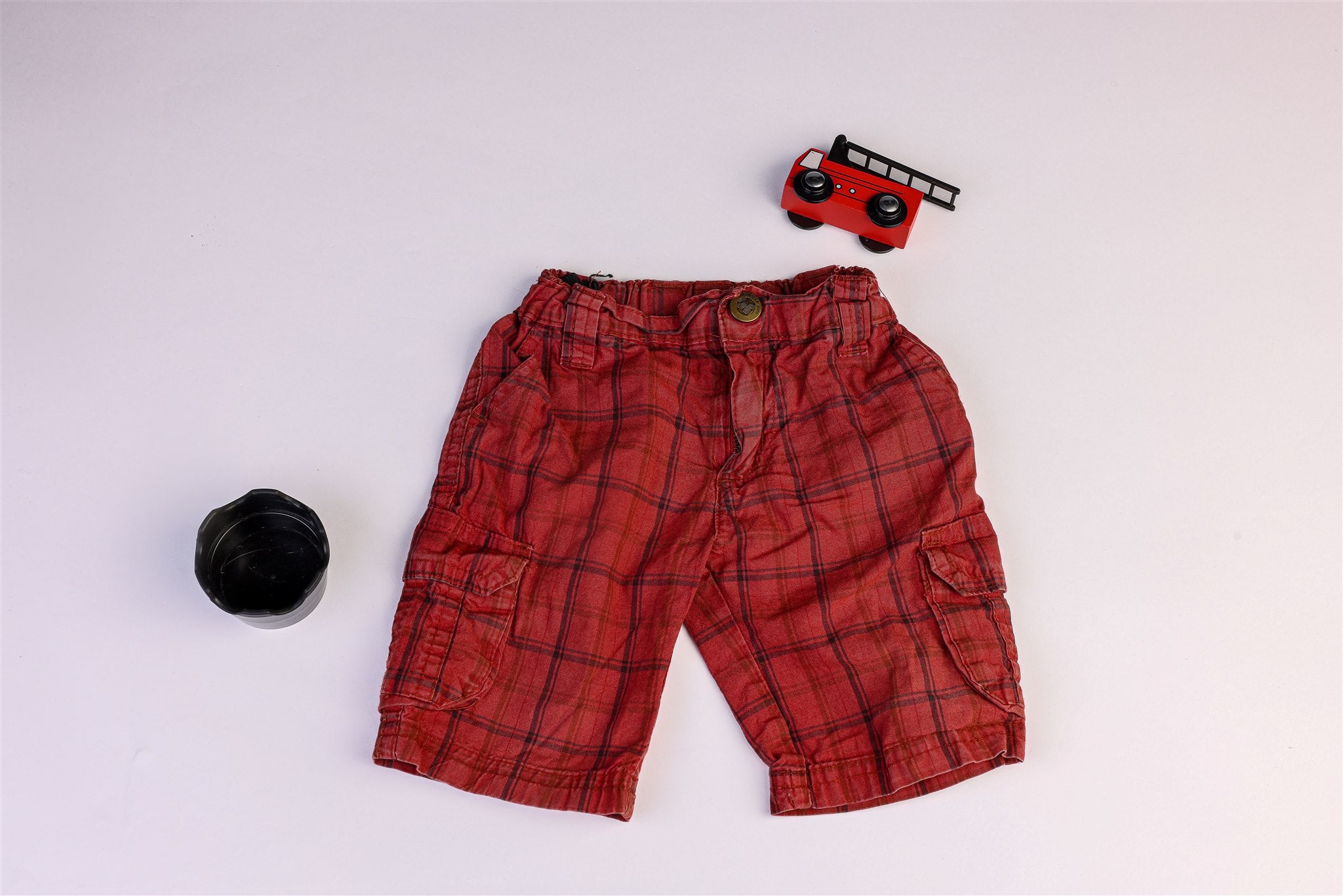 Pale red plaid shorts