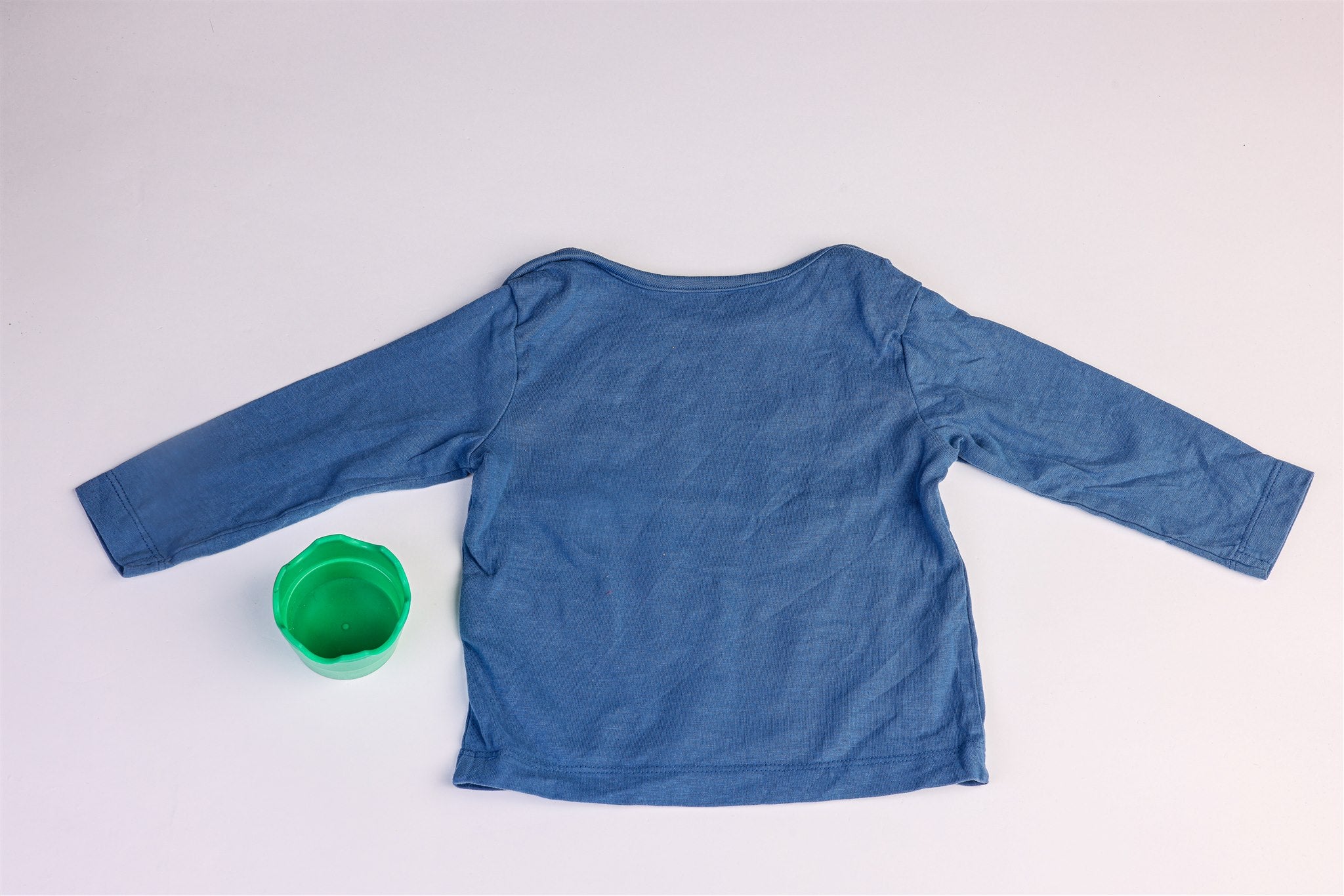 Blue top with little elephants, bird, and tree