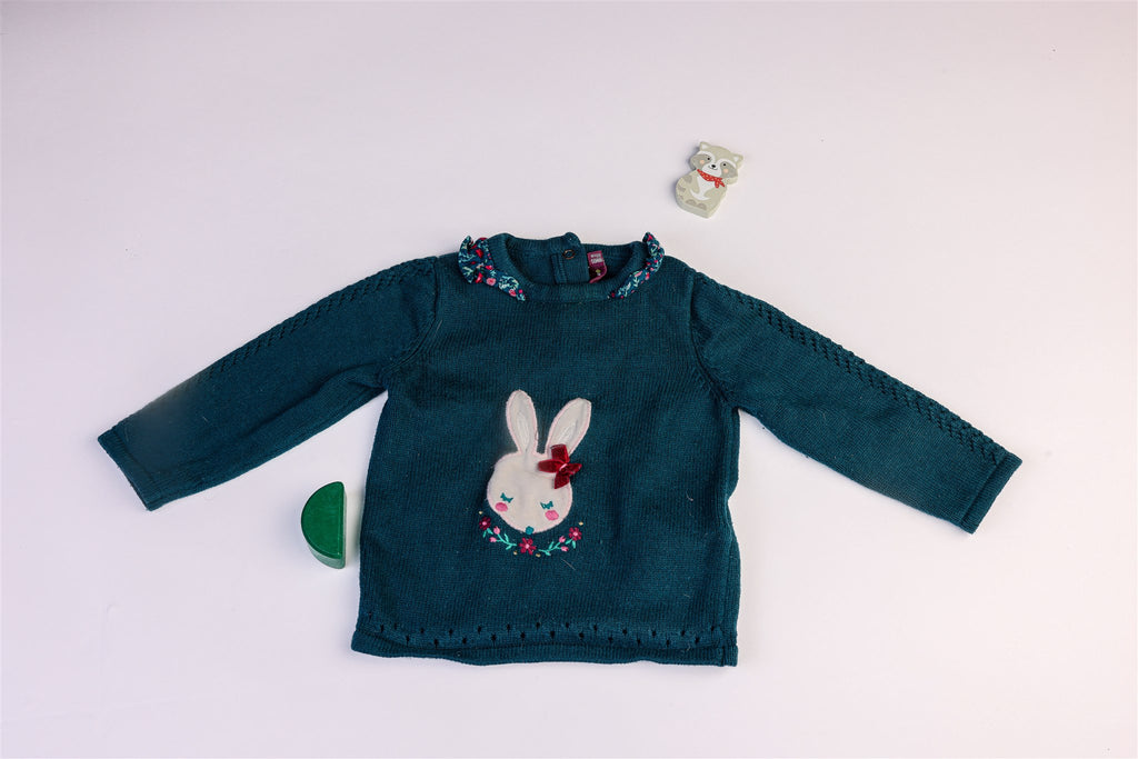 Green jumper with white rabbit and flowers