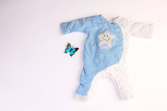 Blue and white smiley face baby sleepsuit