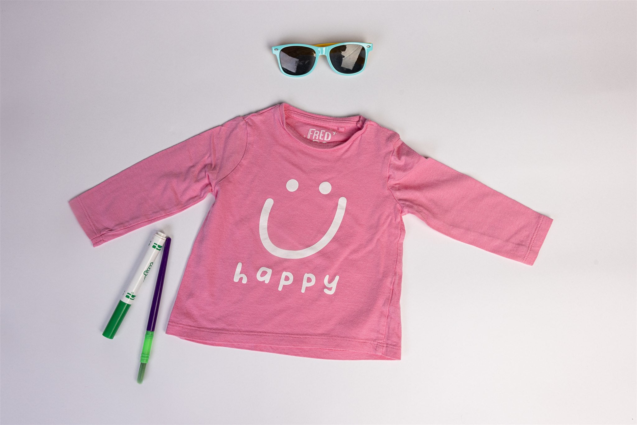Pink smiley and "Happy" Top