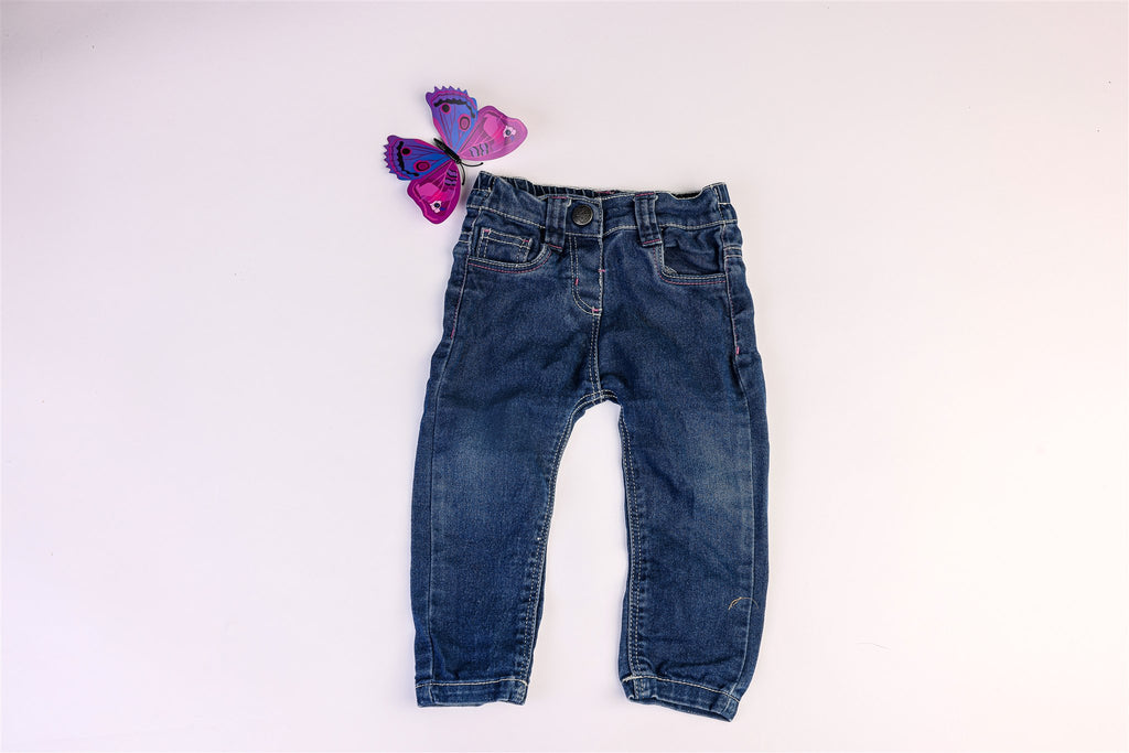 White and pink stitched jeans