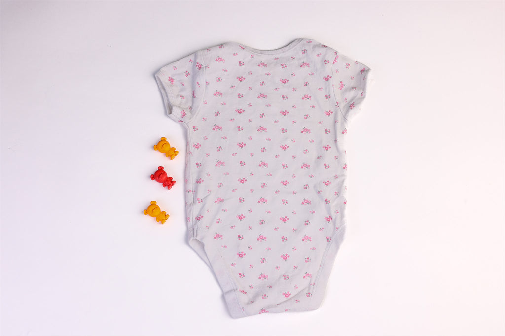 White bodysuit with pink flowers