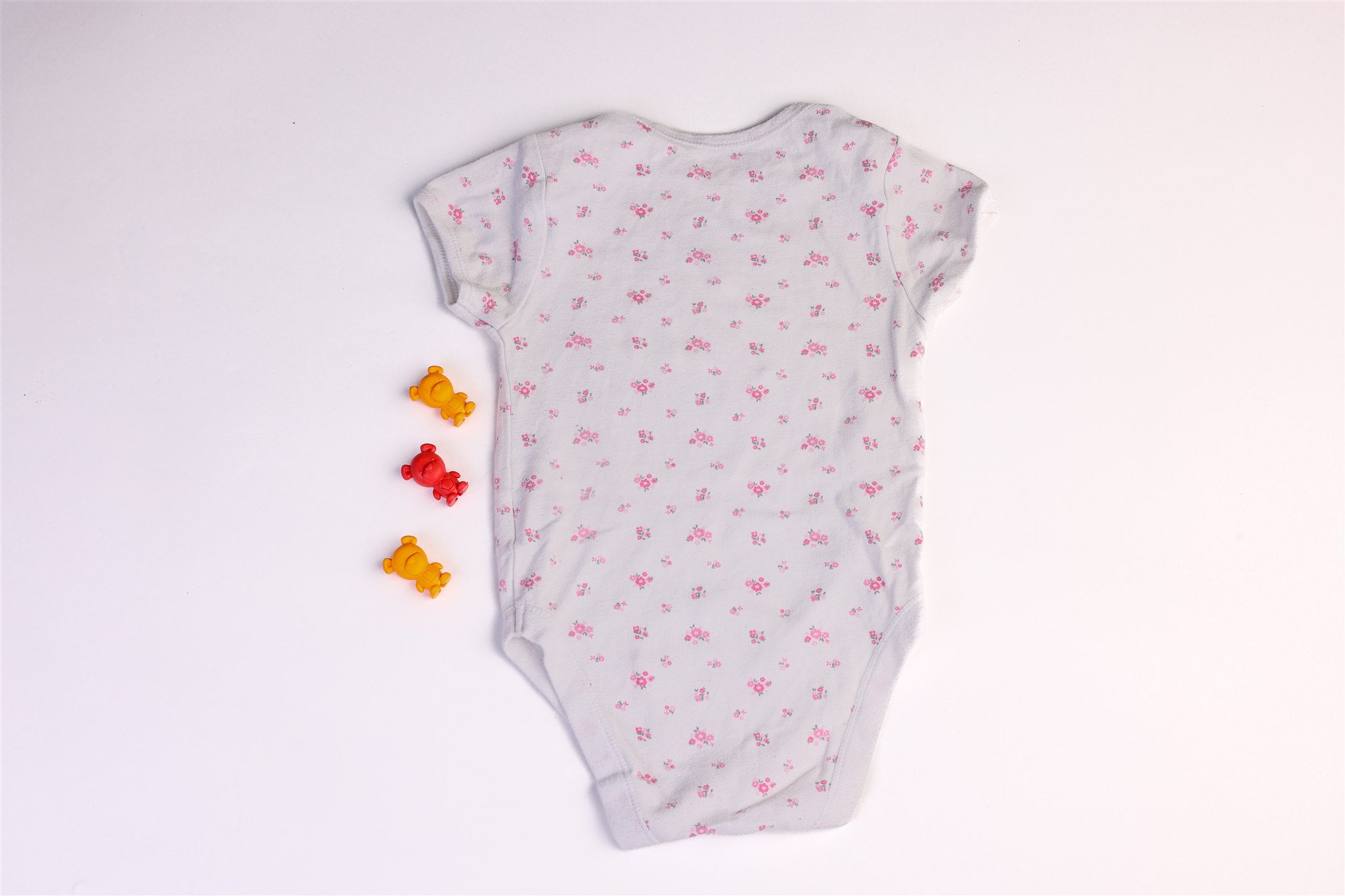 White bodysuit with pink flowers