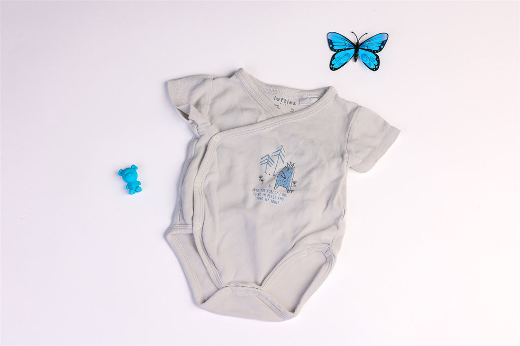 White bodysuit with blue bear