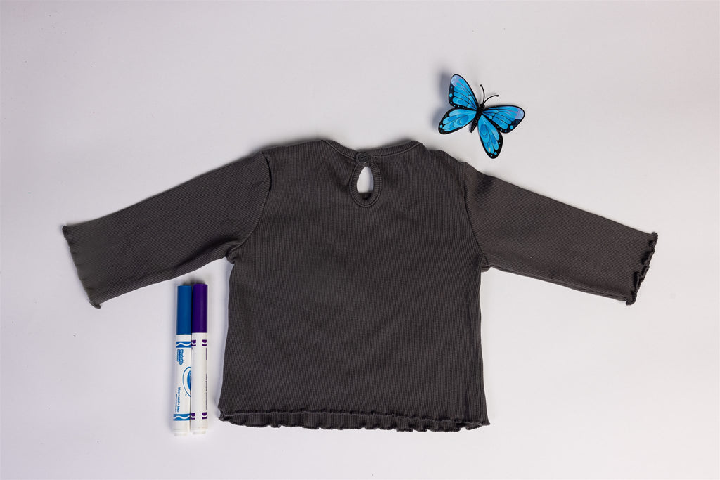 Grey top with ruffled hem and sleeves