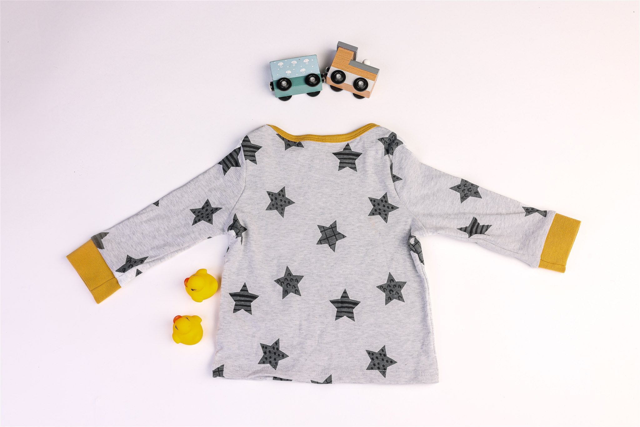 Grey top with black stars