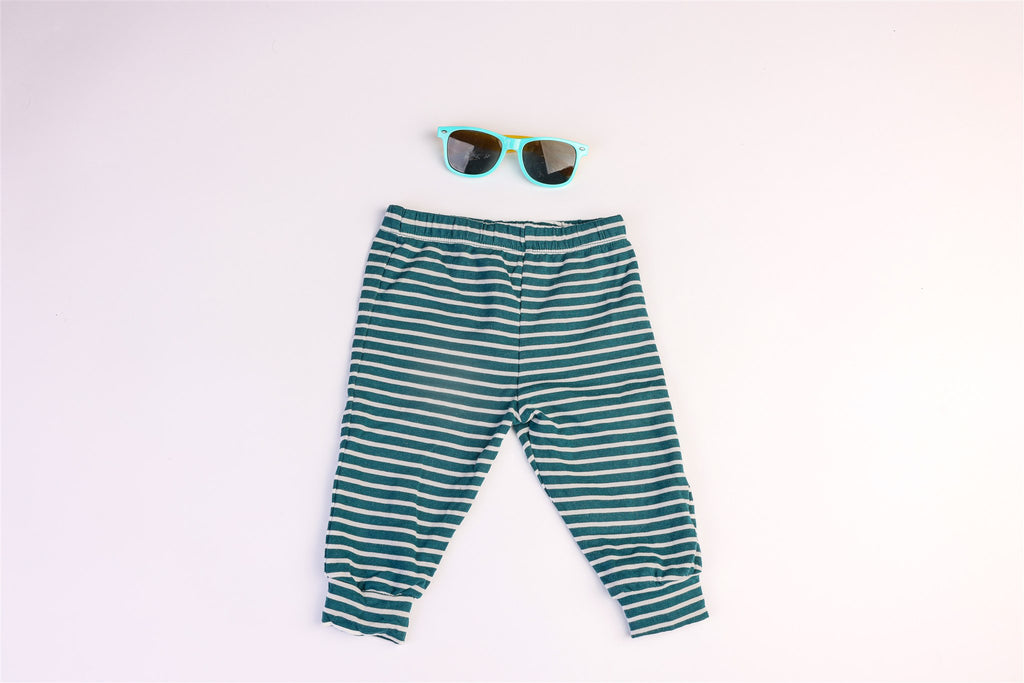 Green and white striped trousers