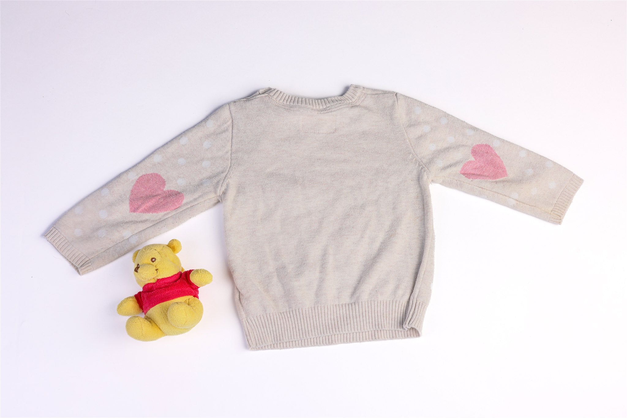 Light-colored owl jumper