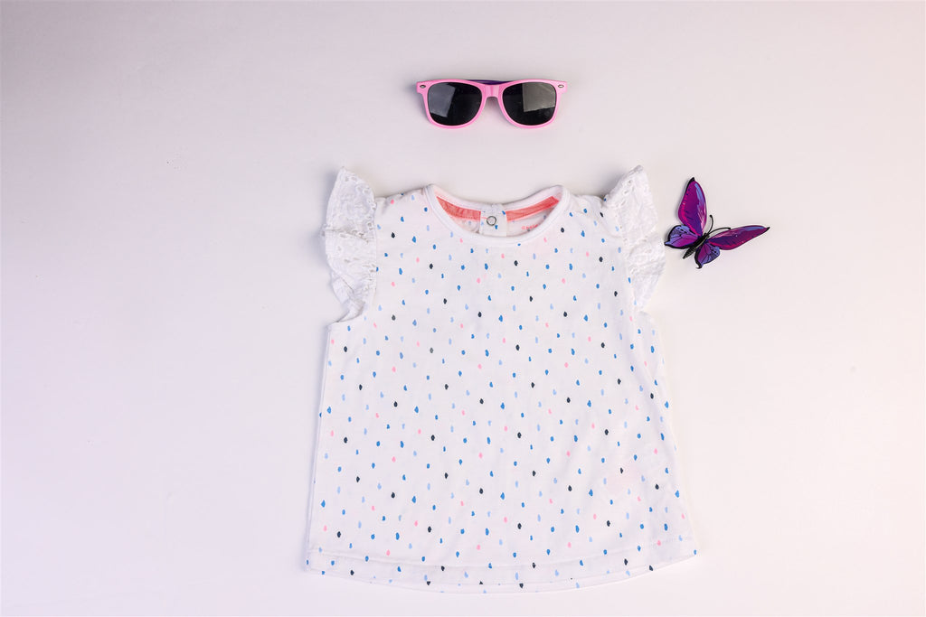 White dotted top with lace-effect sleeves