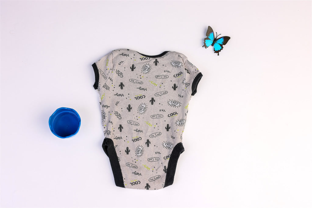 Grey and black bodysuit with cool cactus print and "free hugs"