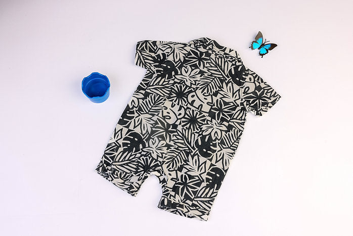 Black and white rompers with leaves