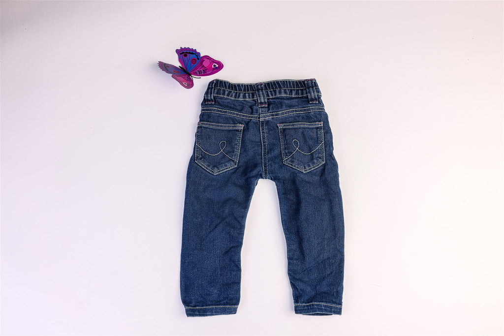 White and pink stitched jeans