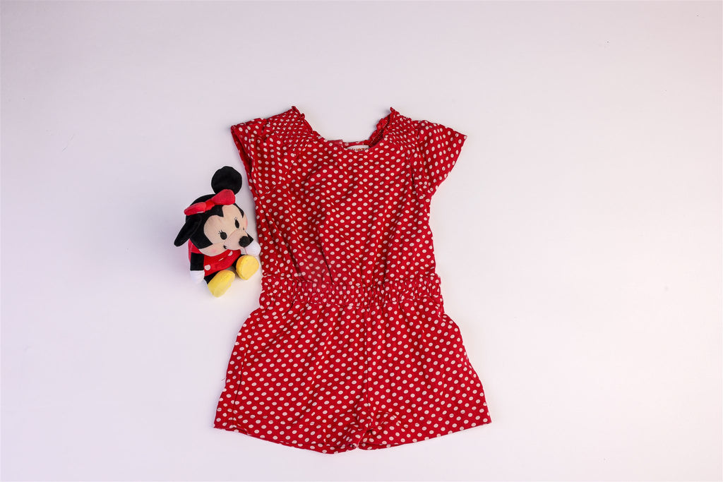 Red dungarees with white polka dots